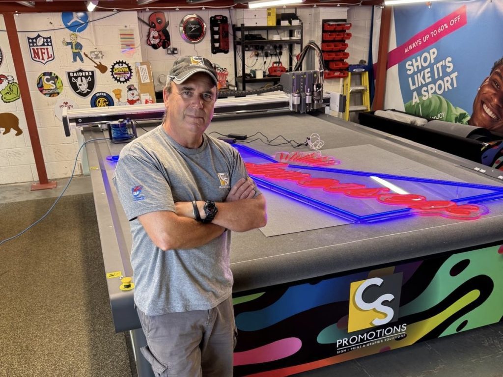 Man stands in front of JWEi cutting table