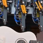 Epson's Direct to Shape Printing System printing on a guitar