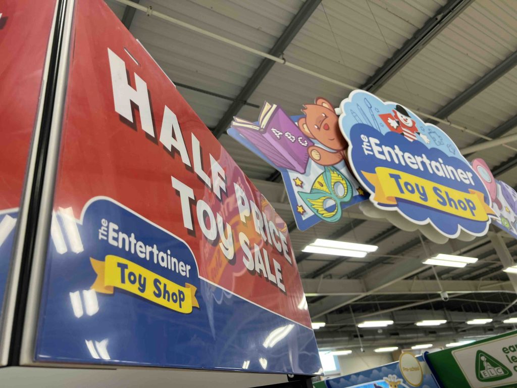 Signs for toys in Tesco Entertainer section