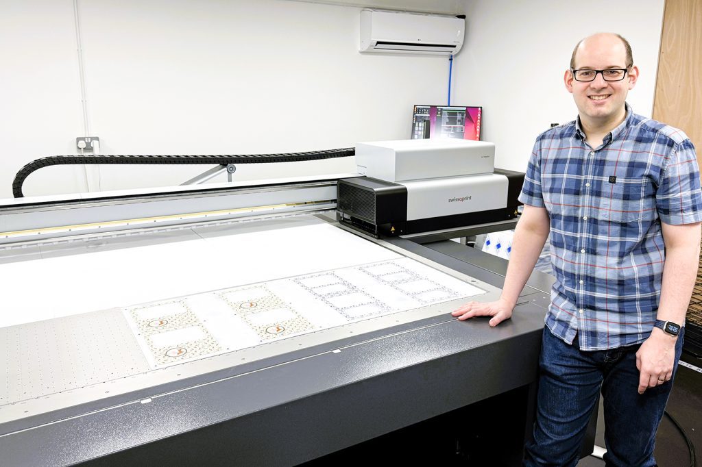 Craig Wanstall of Pip n Chip appreciates their swissQprint flatbed printer to grow their business needs