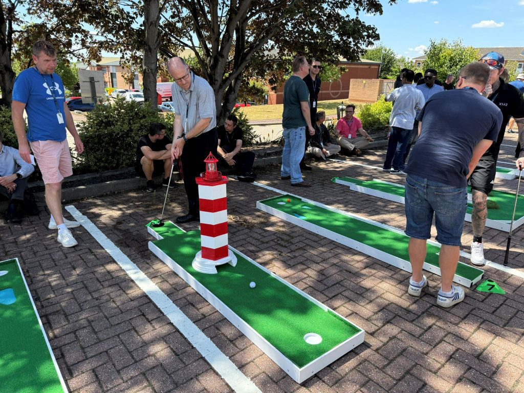 Employees of Xaar and Megnajet enjoying an afternoon of food, games and activities to celebrate 35 years