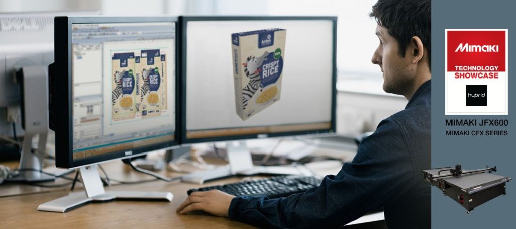 image shows man at computer designing packaging to represent Hybrid Services two day event dedicated to print and cut packaging solutions