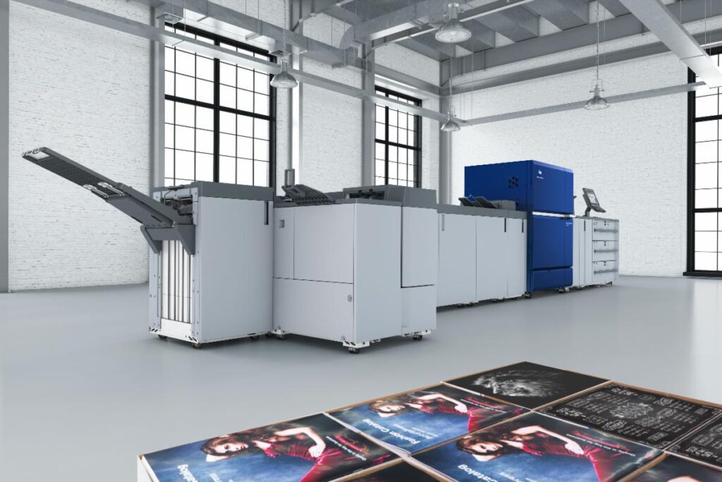 Konica Minolta AccurioPress C14010 digital production printer with output stacker, a press now supporting Color-Logic solutions.