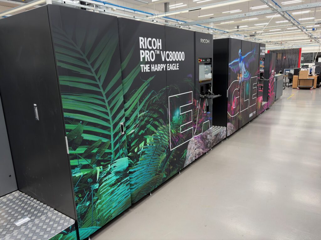The RICOH Pro Z75 and RICOH Pro VC80000 printers were wrapped with Drytac Polar Grip and Interlam Emerytex Pro showcasing application versatility at the European Customer Experience Centre.