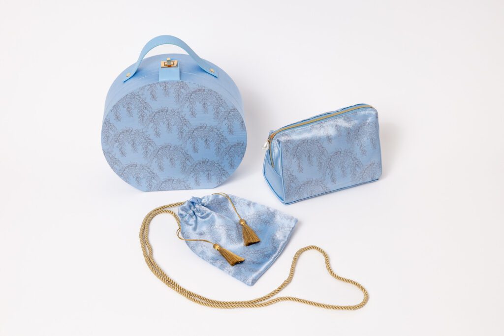 The Hunter Luxury Regency Collection including a vanity case, cosmetics pouch, and drawstring purse