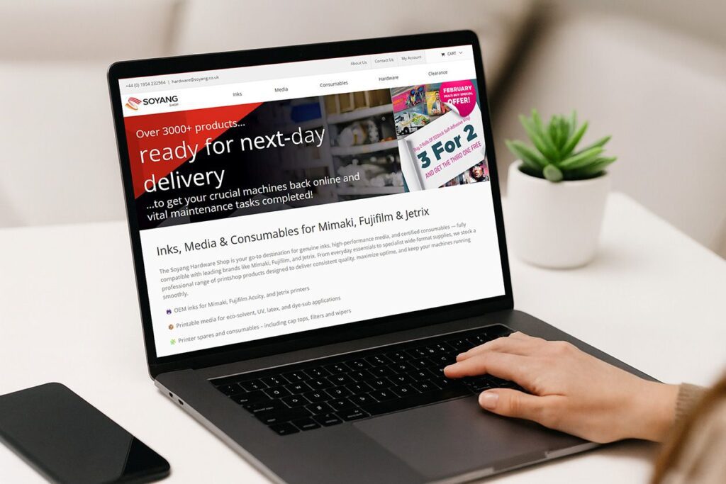 Laptop with new online Soyang Shop page open,