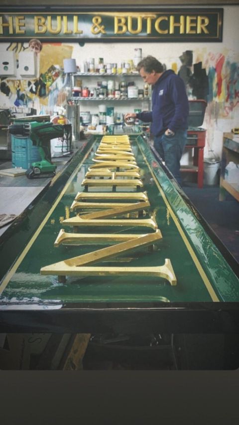 Perry Eales of Perry Signs, who will encourage hands-on participation at SDUK, painting a pub sign