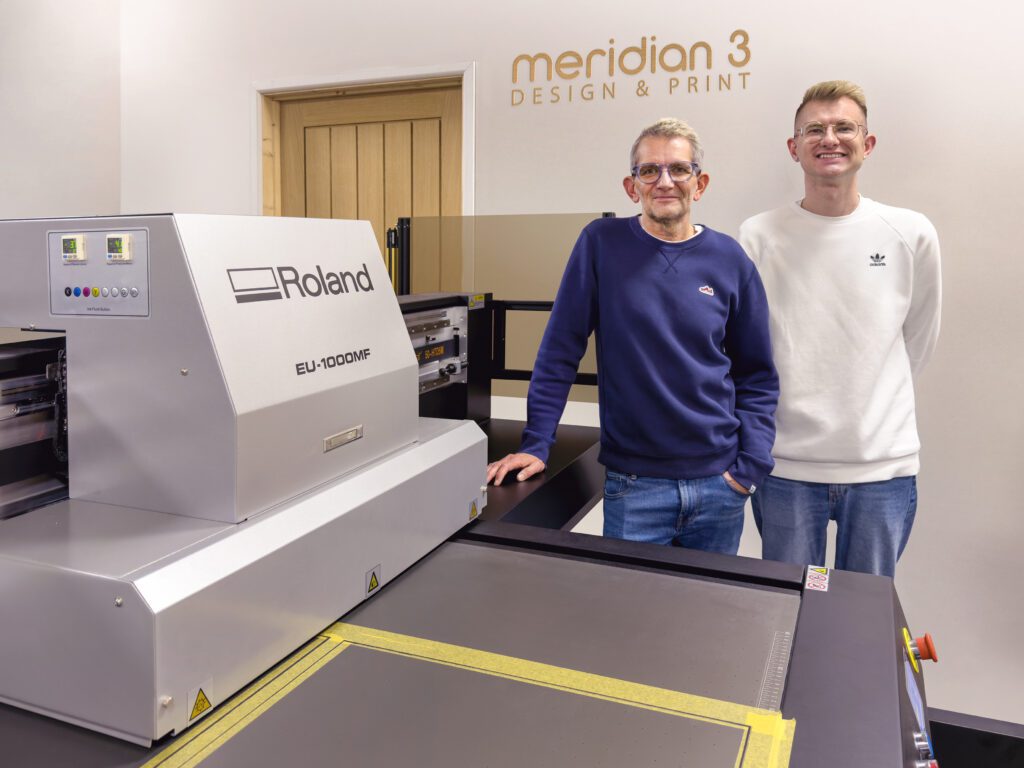 The Meridian 3 team with their new Roland EU-1000MF flatbed printer