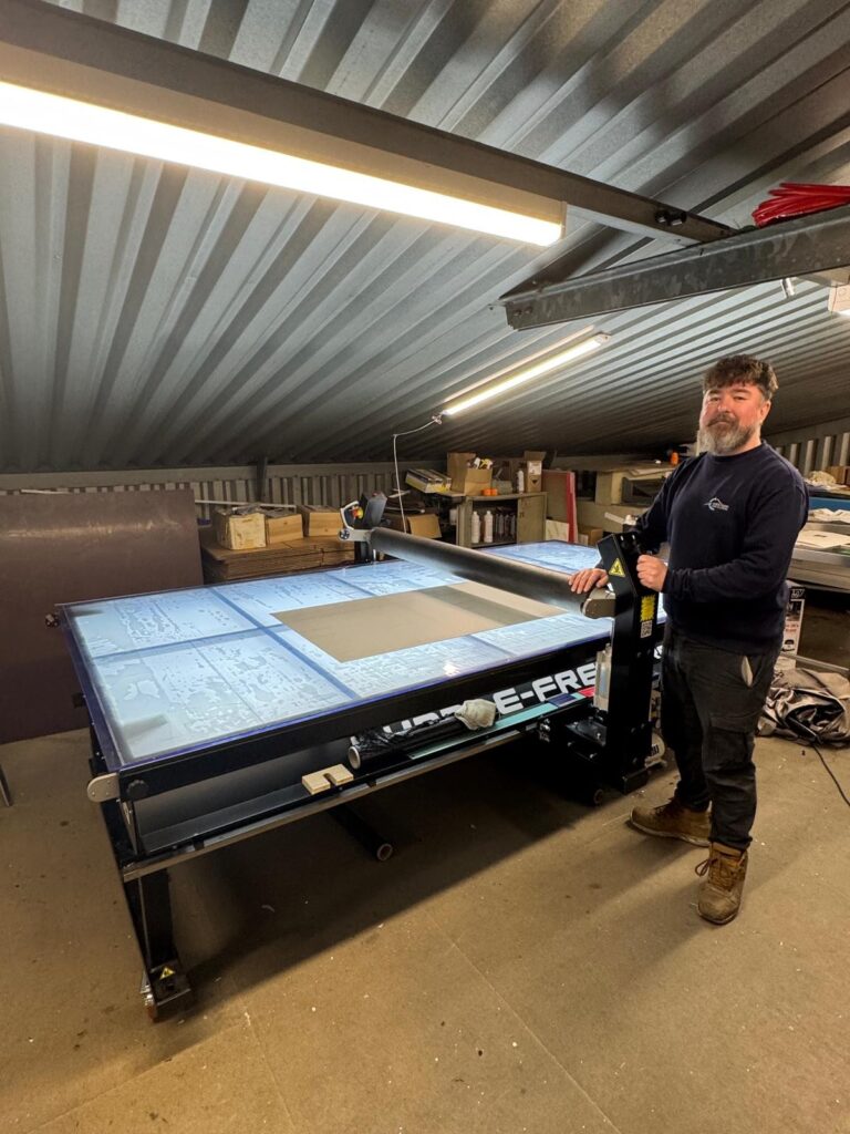 John Hulin, Director at Western Sign Systems, with BubbleFree Pro that has enabled the team to hit tight trade deadlines despite limited floor space.