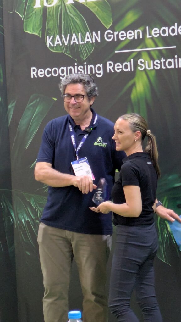 Jack Gocher presents the Powerhouse Award to CMYUK at the Kavalan Green Leader Awards in Barcelona