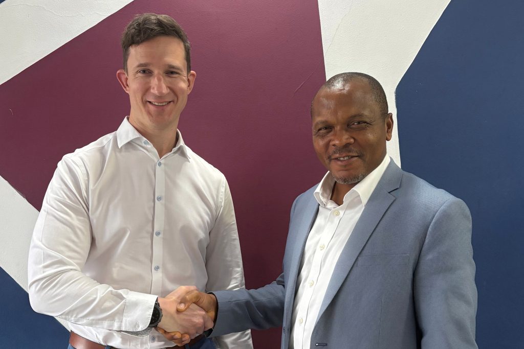 David Lyus of GEW and George Ugwu of Exact Solutions standing together to celebrate their new distribution partnership.
