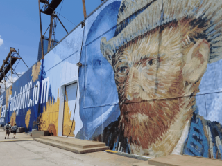 Shows image of Vincent van Gogh on hoarding to advertise exhibition, created using Drytac SpotOn White M50 and Polar Grip
