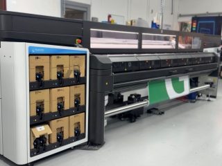 Universal Graphics has secured new contracts, including branding vehicles for An Post, Ireland's national postal service
