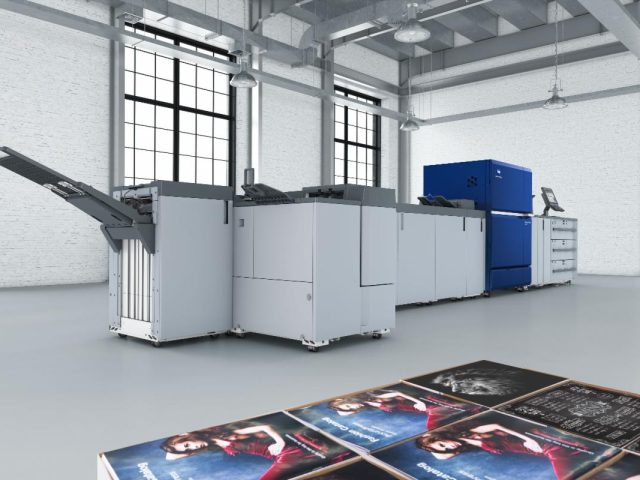 Konica Minolta AccurioPress C14010 digital production printer with output stacker, a press now supporting Color-Logic solutions.