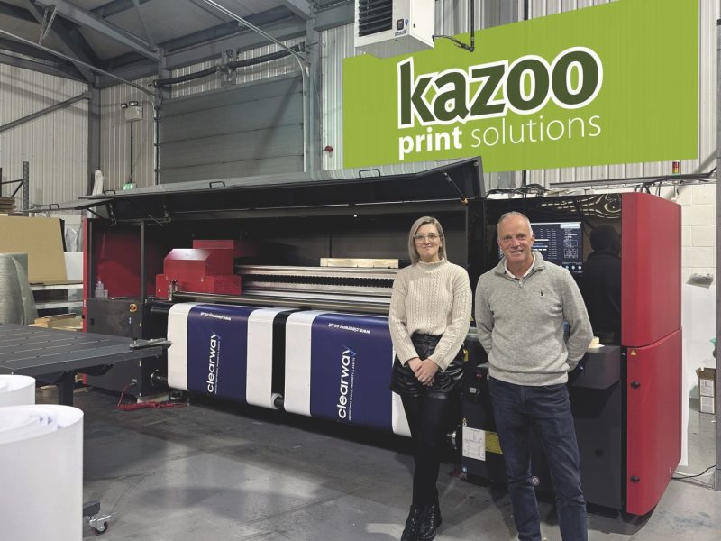 Kazoo’s new EFI Pro 30h running dual feed, pictured with Simon Talbot, Director, and Charlotte Smallman, Operations Director.