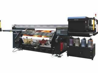 Mimaki Tiger600-1800TS wide-format printer with AP50 aqueous pigment ink system showing printed poster output