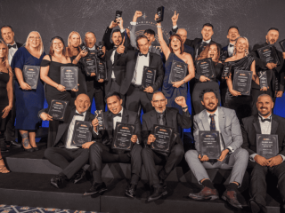 Signs Express awards winners celebrating their success at the 2026 convention