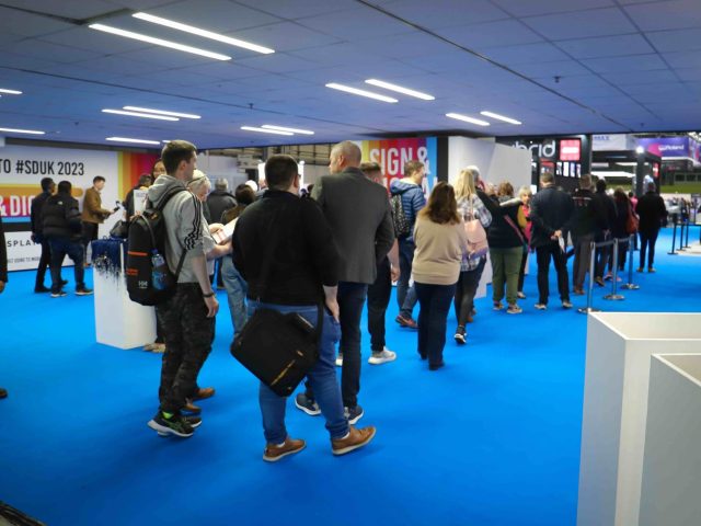 people entering Sign & Digital exhibition
