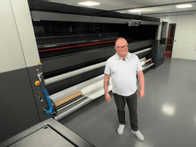 MD, Mark Mashiter introduced the event next to the 5m Fujifilm