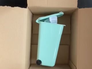 Tom Barnes' trash can mailer always captures attention
