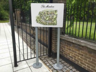 sign bolted to concrete and brick paving using Sign Trade Supplies bolt down kit