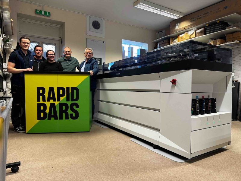 The Image Corporate team with a Canon large format printer