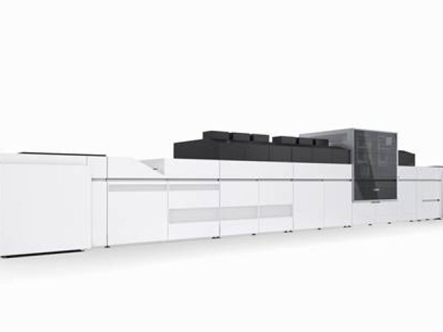 A large, industrial Canon varioPRESS iV7 B2 sheetfed production inkjet printer