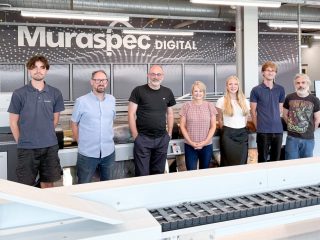 John Langfield (centre) and the team at Muraspec with their new Karibu roll to roll printer.