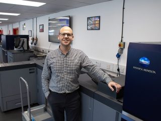 Kristian Harrington, Managing Director at The Mailing People with the new AccurioPress C12010